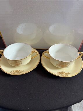 Haviland Pale Yellow and Gold Double-Handled soup bowl Set with Saucers